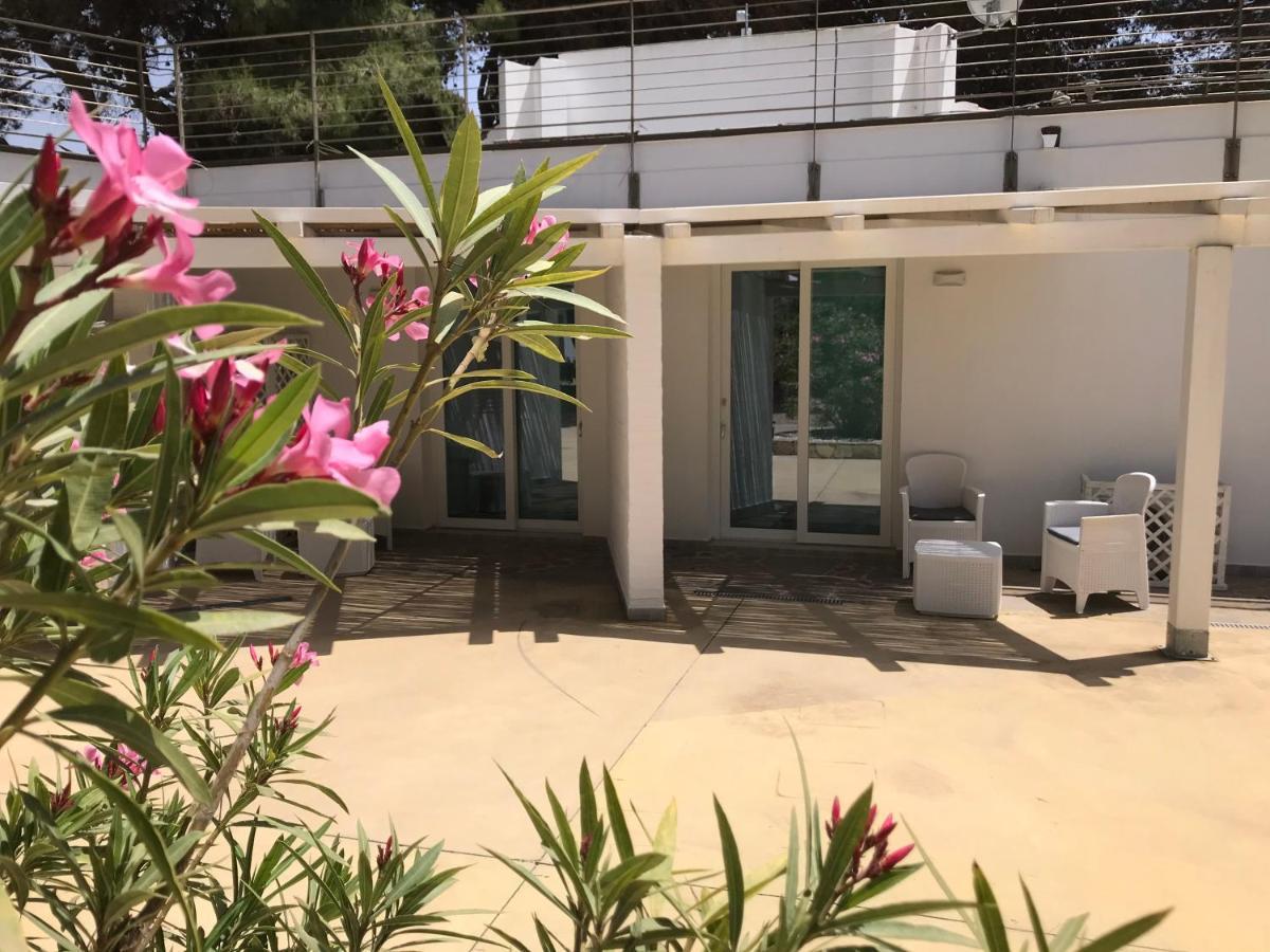 Angolo Mare Apartments & Rooms Porto Pino Exterior foto